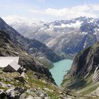 Blick auf Gelmer-Hütte und See