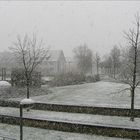 Blick vom Balkon ins Schneetreiben