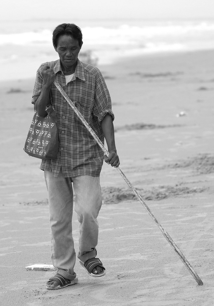 Blind man on the shore