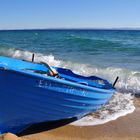 Blue boat on the beach