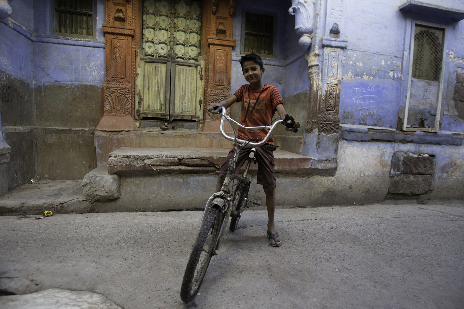 [ … blue city cyclist ]