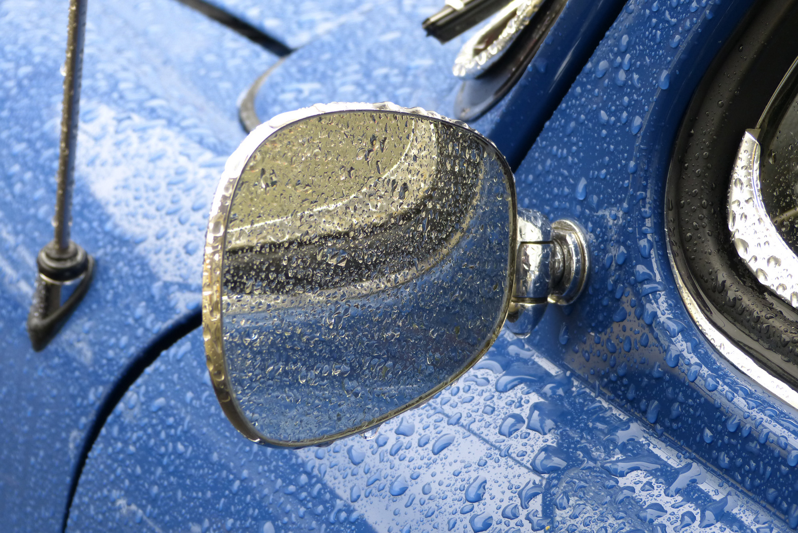 Blue rainy car