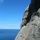 blue water and a cliff