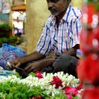 Blumenbinder in Indien