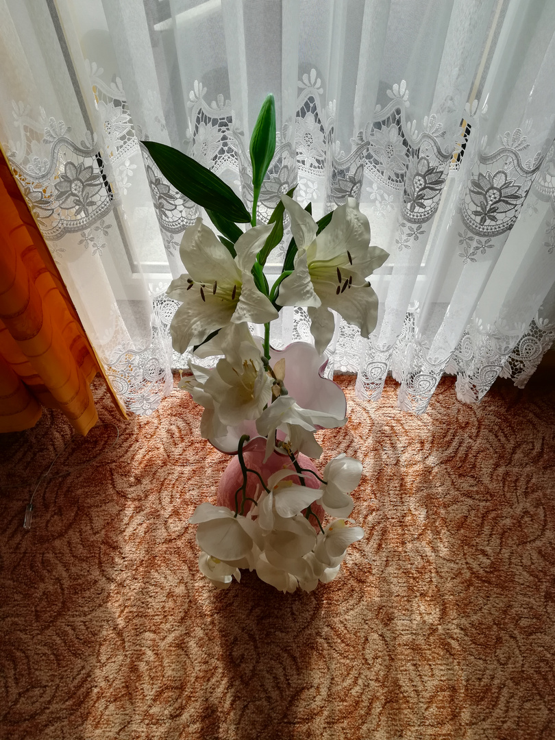 Blumenvase am Balkon