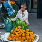 Blumenverkäuferin in Vietnam