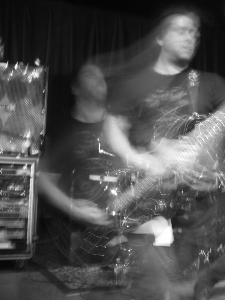 Blurry guitarist.