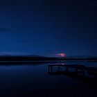 Blutmond mit Wetterleuchten