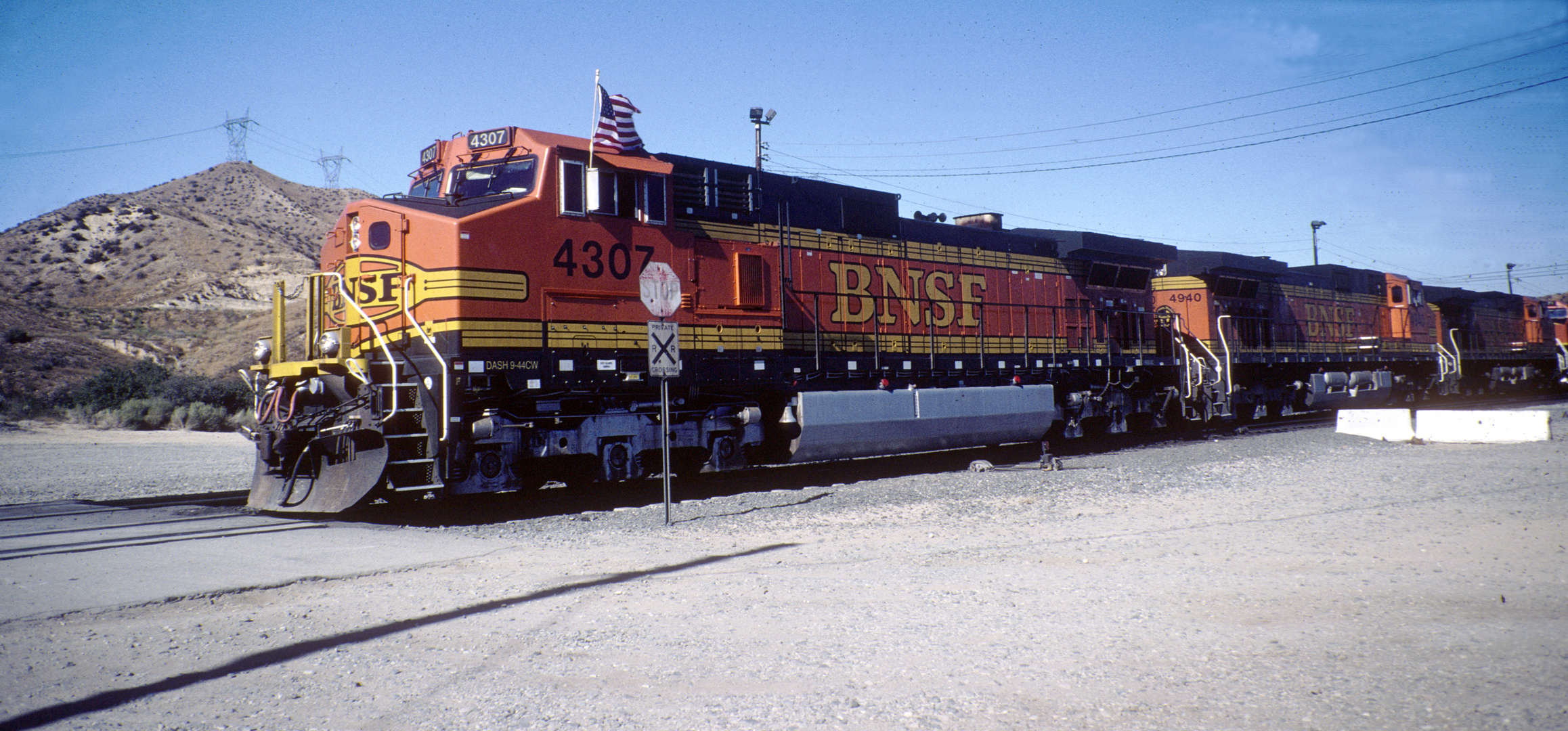 BNSF #4307 with US Banner in Remember of 9-11, Cajon Pass, CA