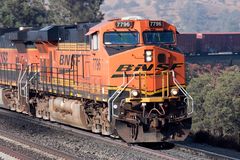 BNSF #7796 ES44DC leads a long freight train over the Tehachapi Loop, CA, USA