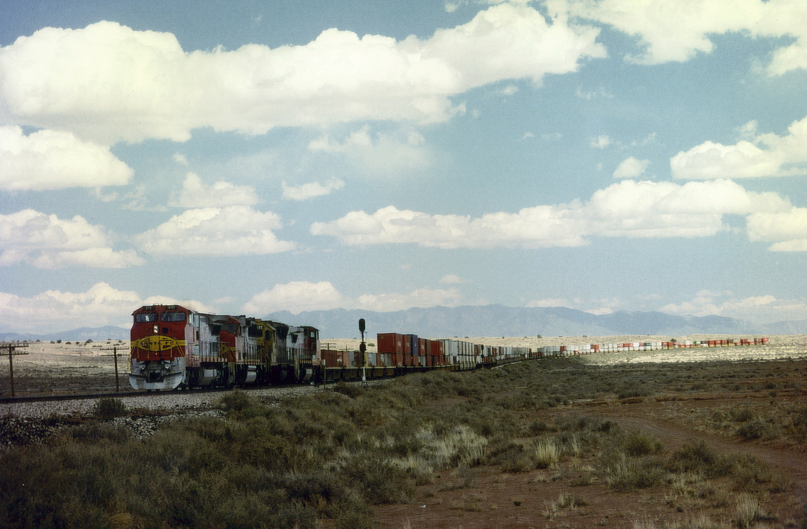 BNSF (ex Santa Fe) ATSF #510 leads a Freight Train through the desert of New Mexico...