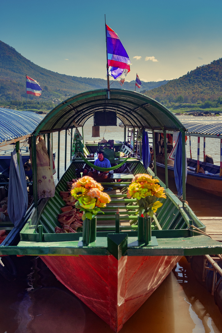 Boarding for a tour on the Mekong