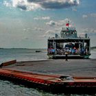 Boarding the ferry to across the Mekong branch