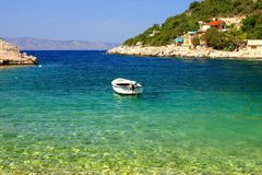 Boat in adriatic´s changing blue