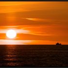 Boat in sunset