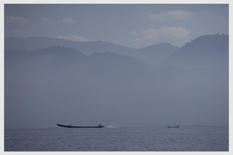 Boat on Inle Lake in twilight