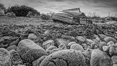 boat on the rocks