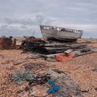 Boat yard ensmable on a gery day.