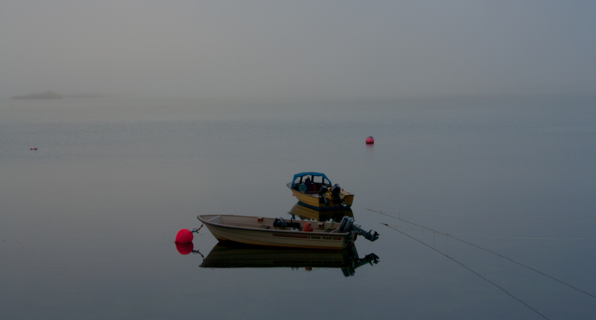 boats in the fog