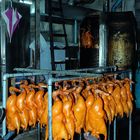 Bodies hanging to get prepared for Peking duck