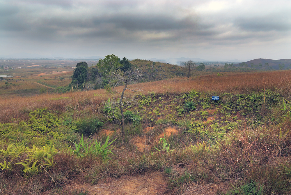 Bomb crater remain of a horrific history in Laos