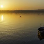 Boot im Sonnenaufgang