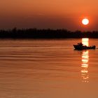 Boot im Sonnenuntergang