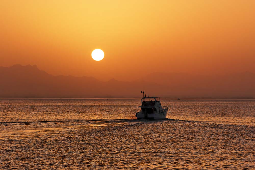 Boot im Sonnenuntergang