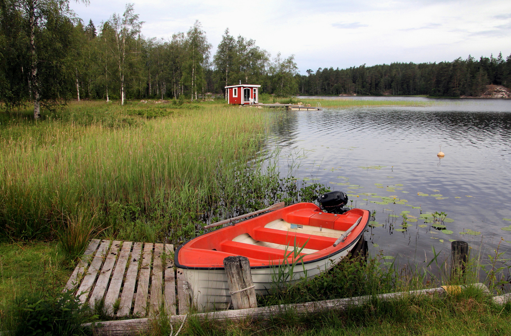 Boot und Sauna am See