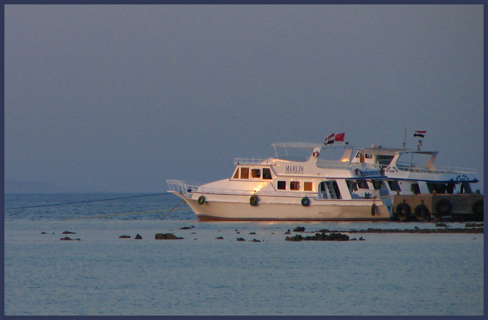 Boote im Sonnenuntergang