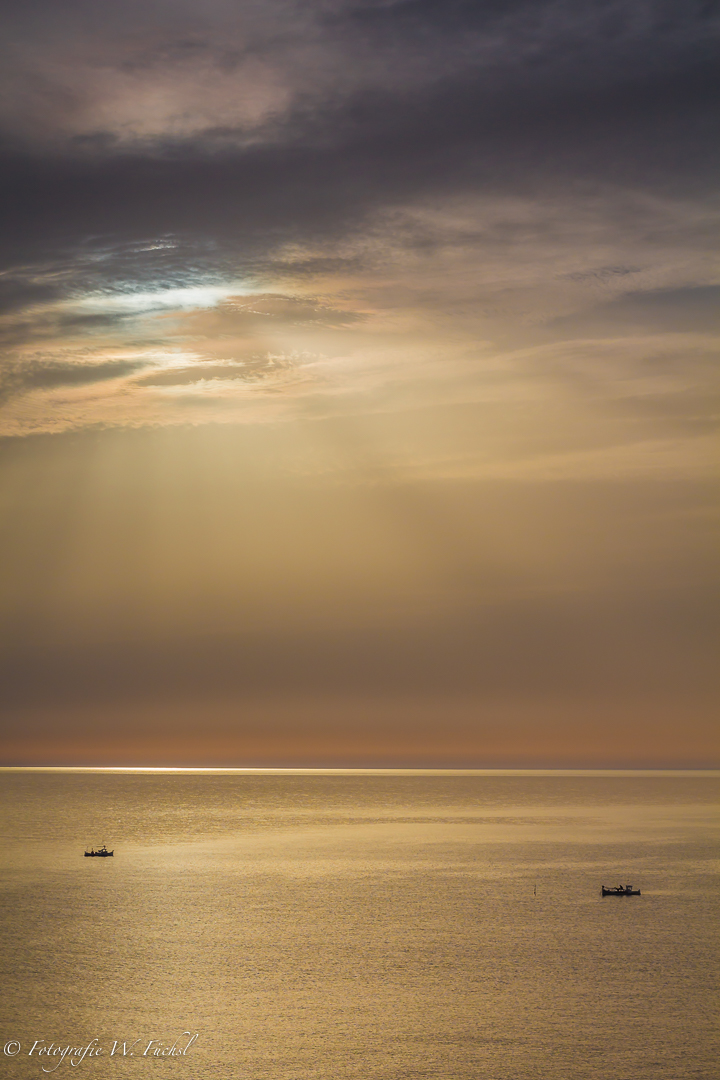 Boote im Sonnenuntergang