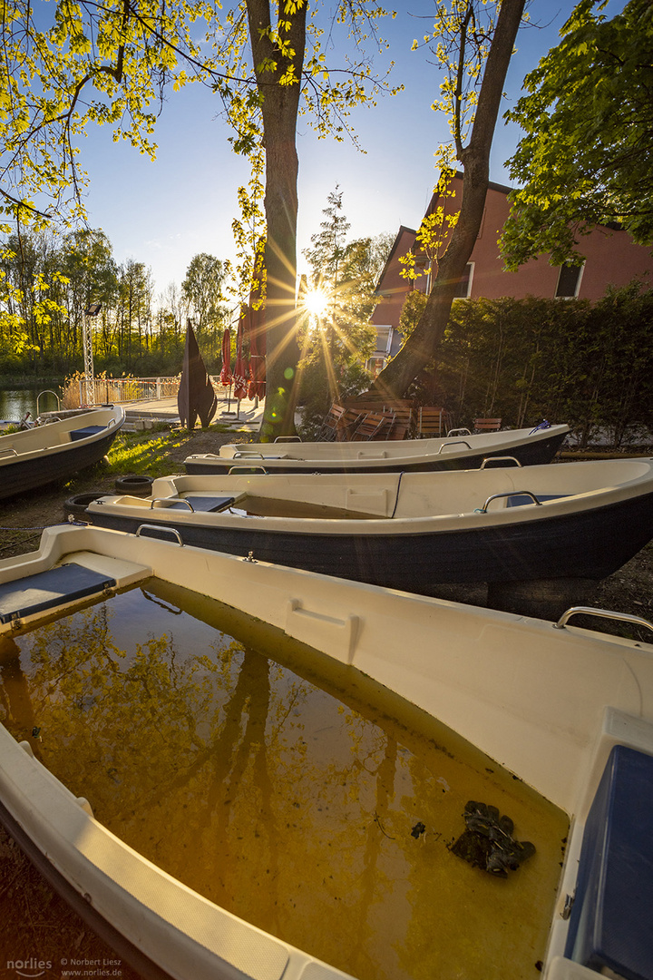 Boote mit Sonnenstern