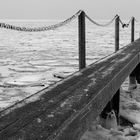 Bootsanleger an der zugefrorenen Nordsee