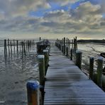 Bootssteg in Rantum auf Sylt im Wintermantel