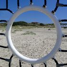 Borkum 2010 - Blick durch ein Strandtor auf das "Café Sturmeck"