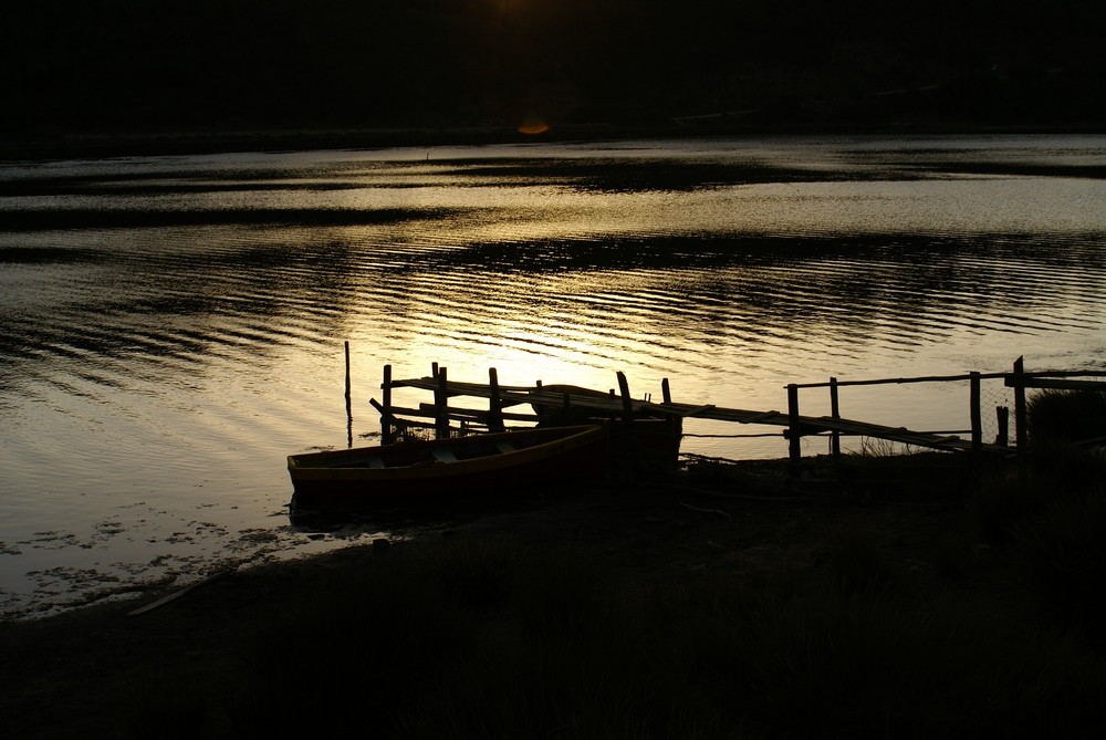 Botes en penumbra