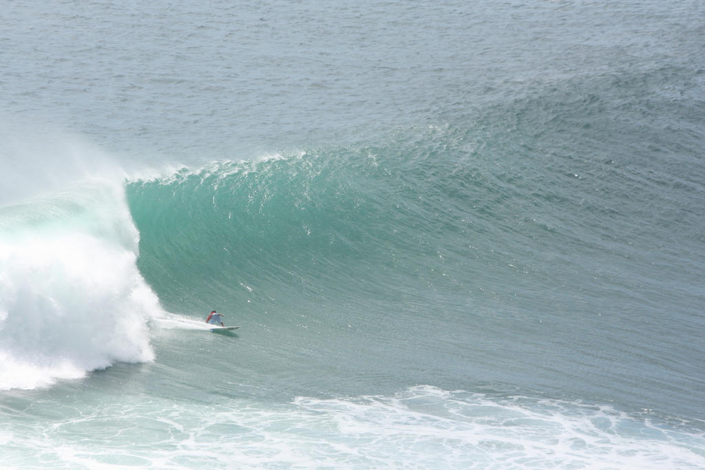 Bottom Turn on massive Set-Wave at Padang-Padang, Bali, Indonesia