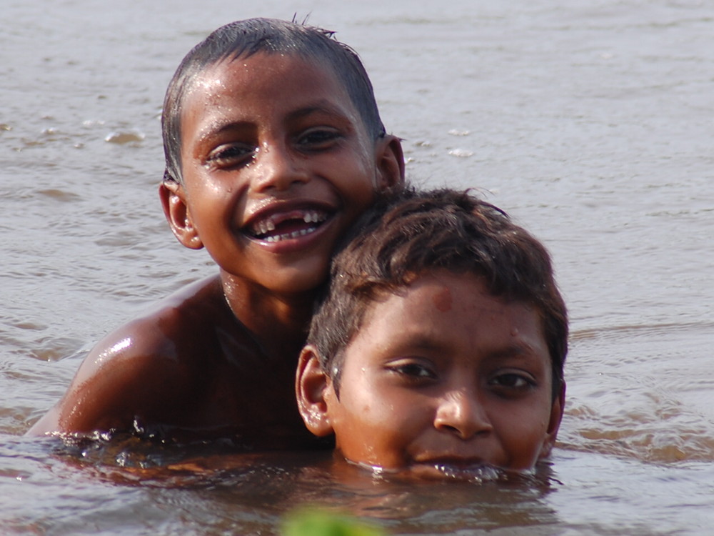 boy and boy. swimming.