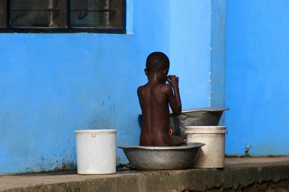 Boy and the blue wall