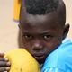 Boy and the yellow soccer ball