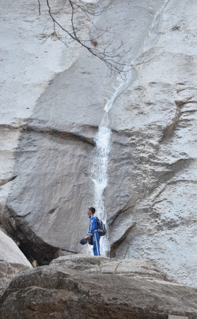 Boy at Waterfall