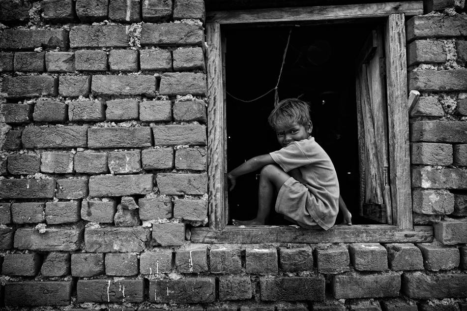 boy in a window