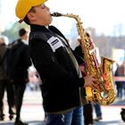 boy playing saxophone