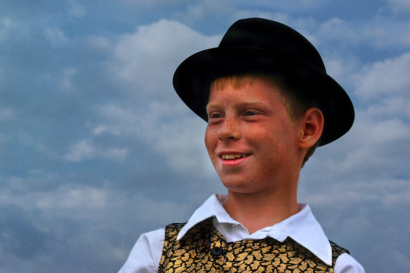 Boy With A Black Hat