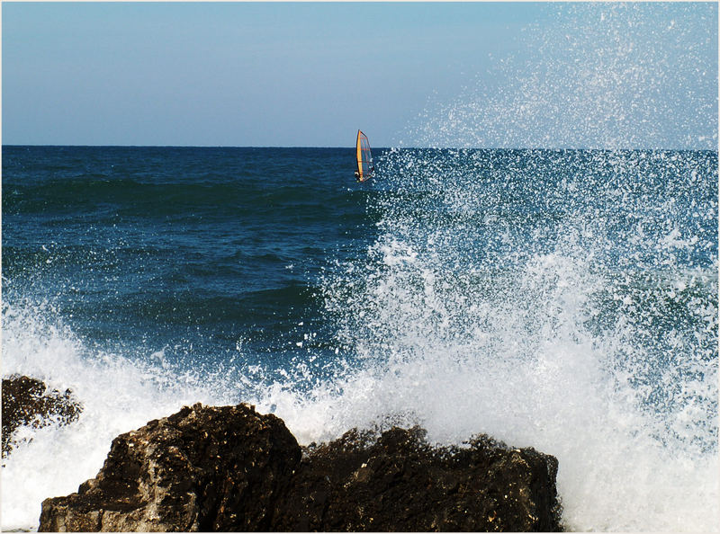 Brandung mit Surfer