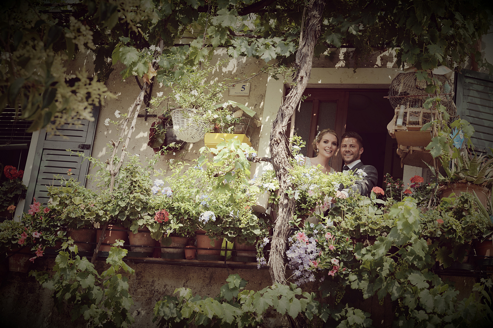 Bride and Groom on the balcony.