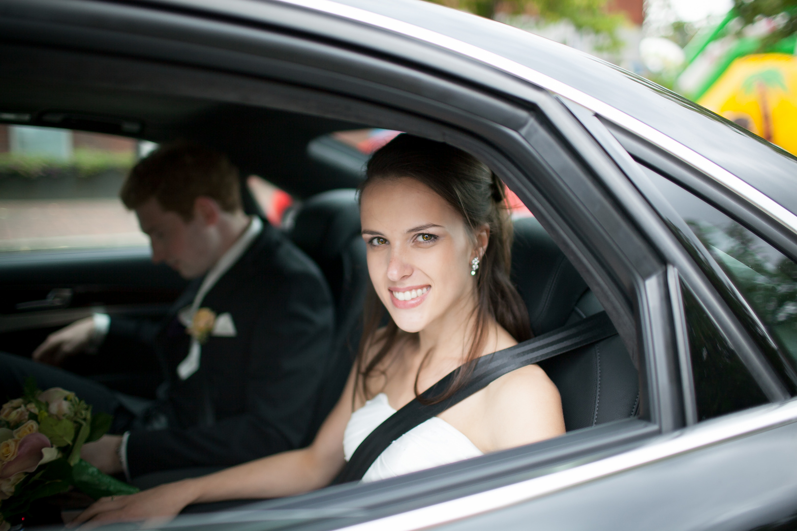 Bride in car