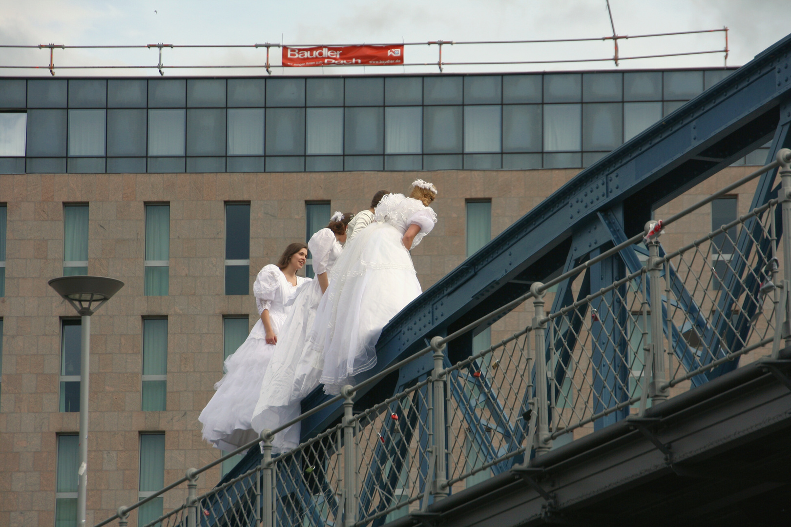 Brides on a bridge