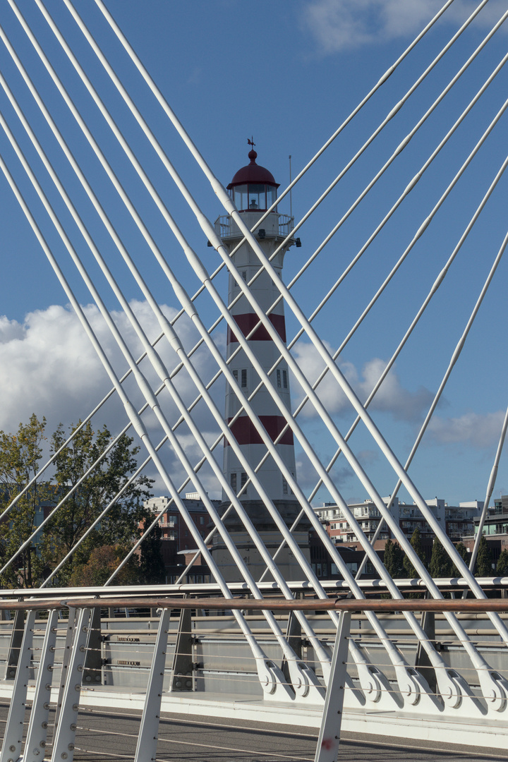 Bridge in front of lighthouse