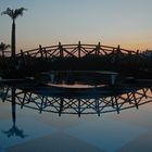 Bridge over calm water....